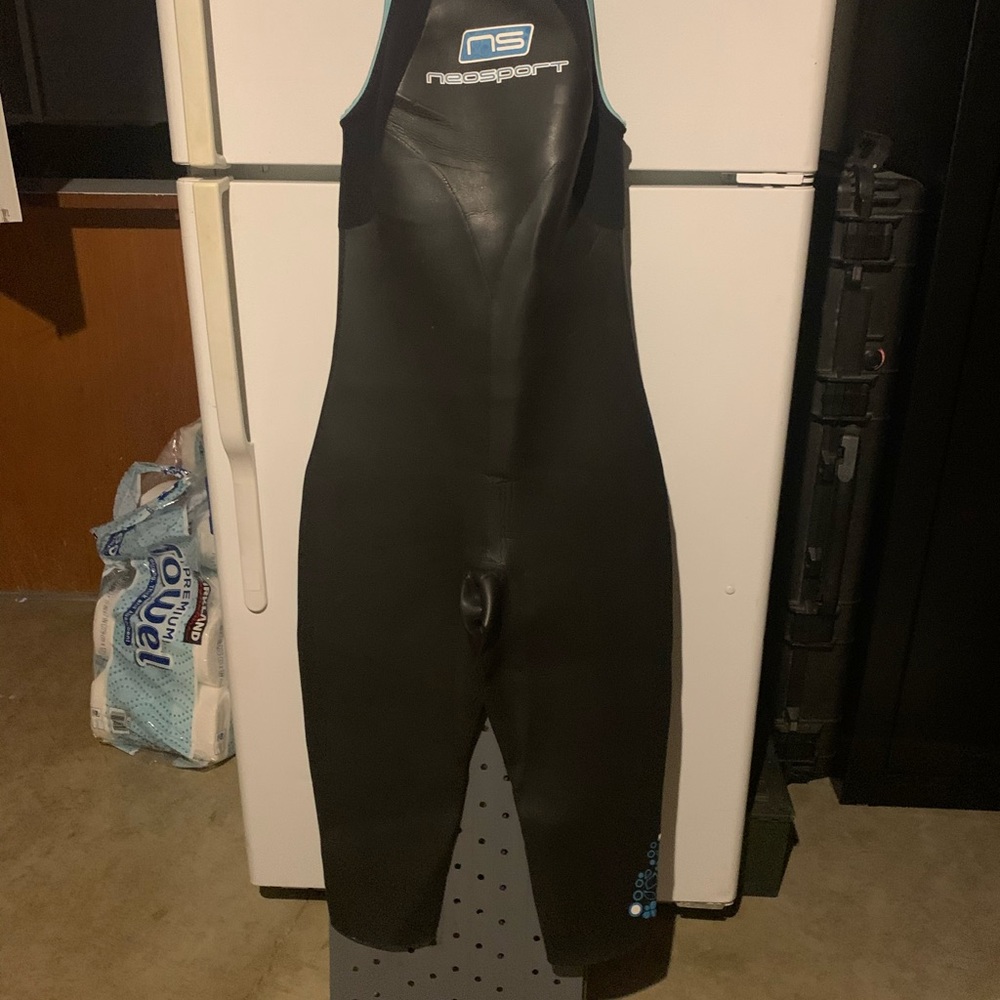 Women’s sleeveless, full length wetsuit.
